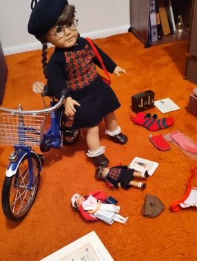 Retired American girl Doll Molly And Molly's Bike And Two Mini Molly Dolls